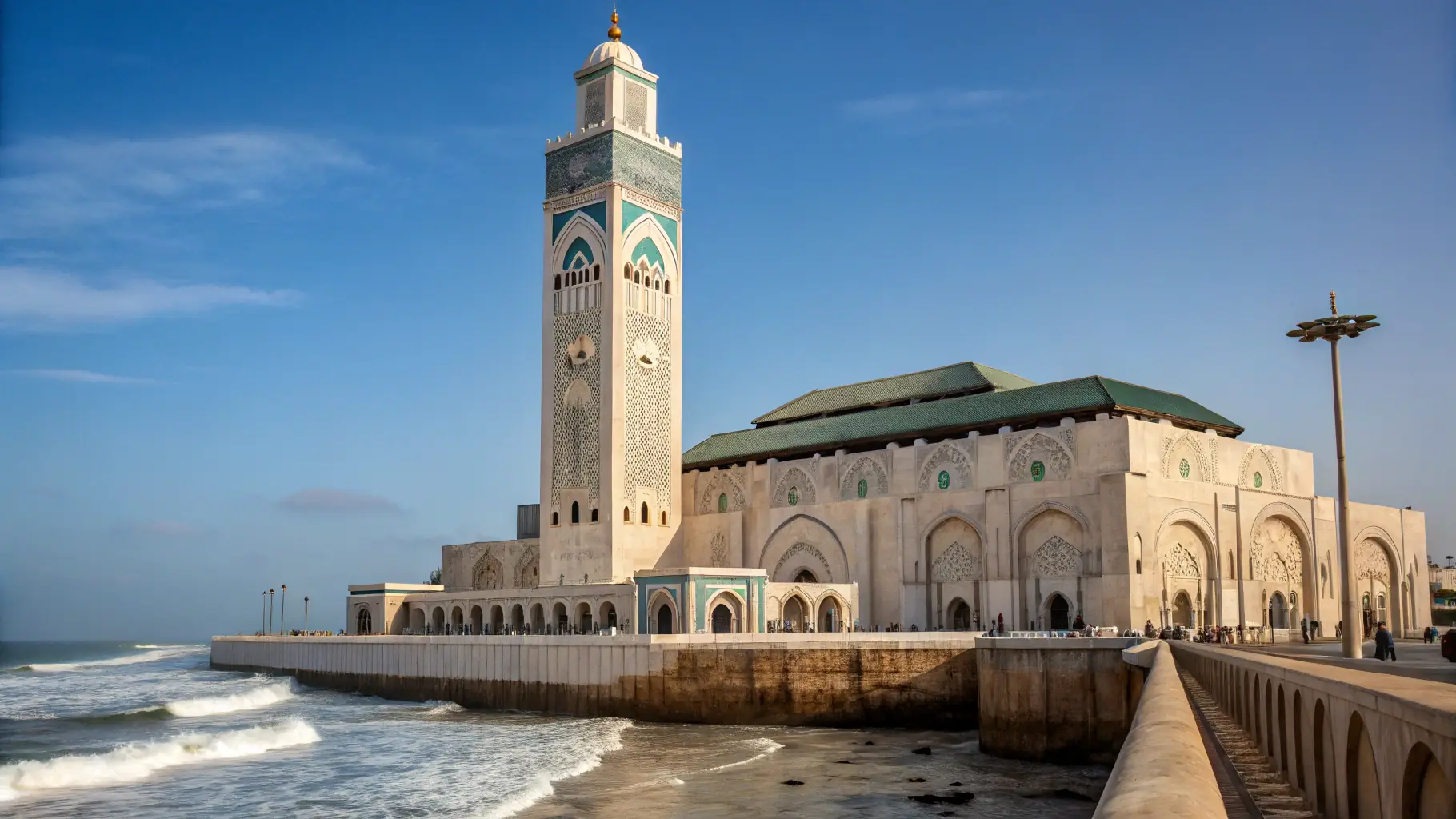 A panoramic view of Casablanca's skyline with the Hassan II Mosque prominently featured.