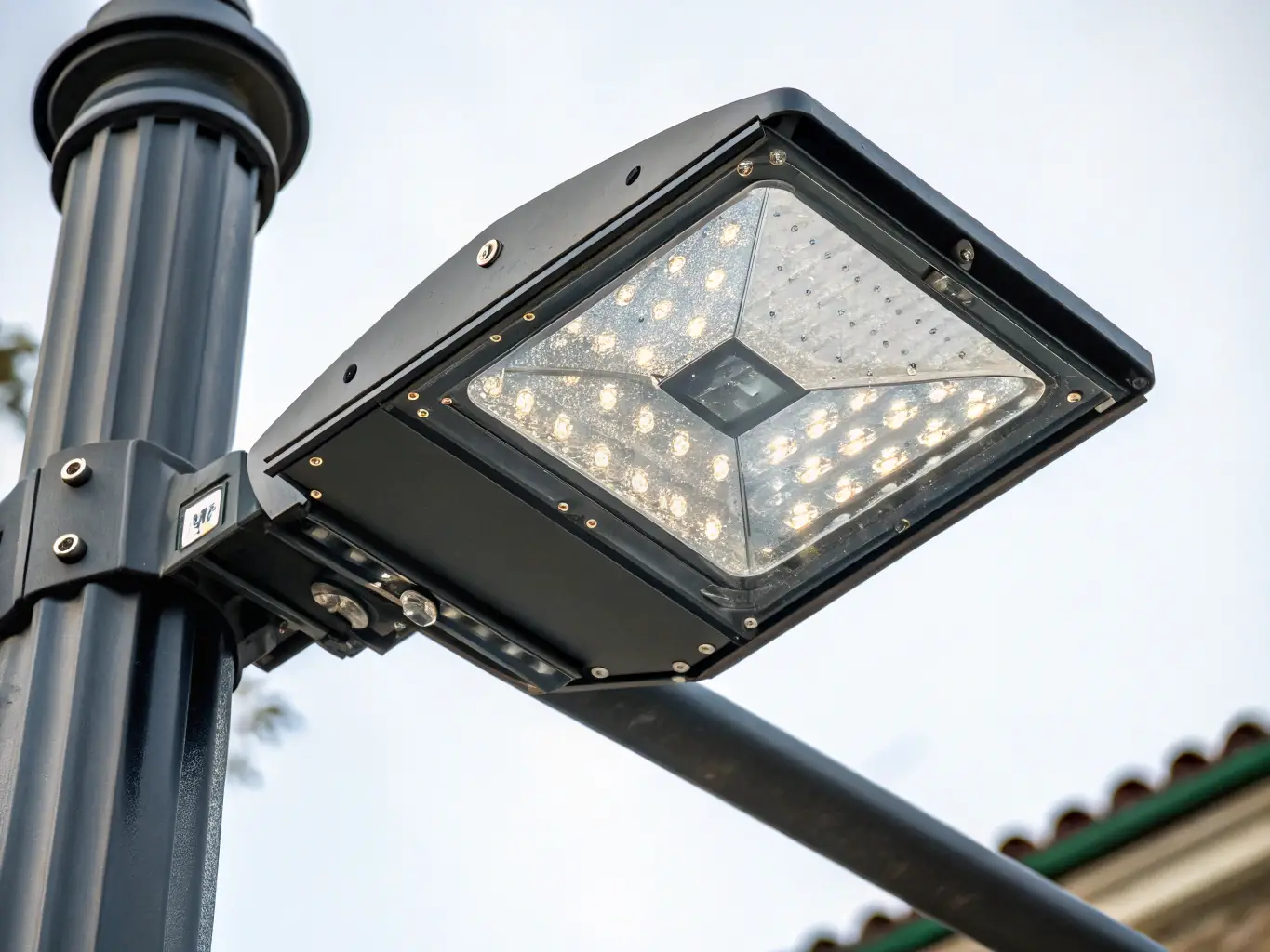 Close-up of high-efficiency LED modules and integrated optics in a solar street light.