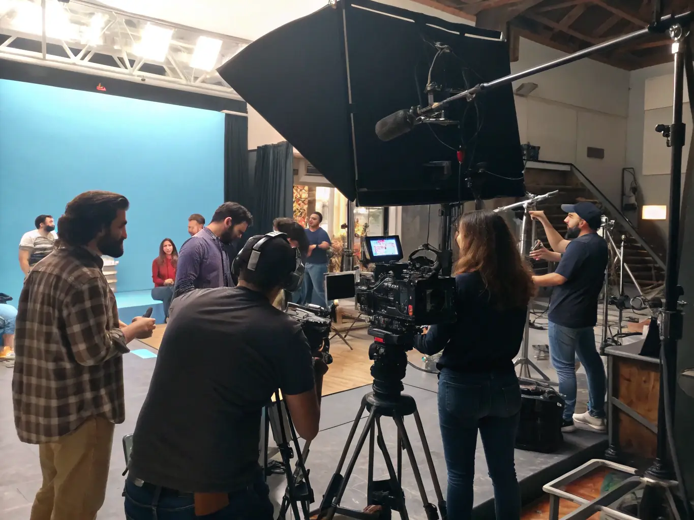 A diverse team collaborating on a film set, emphasizing storytelling and visual creativity.