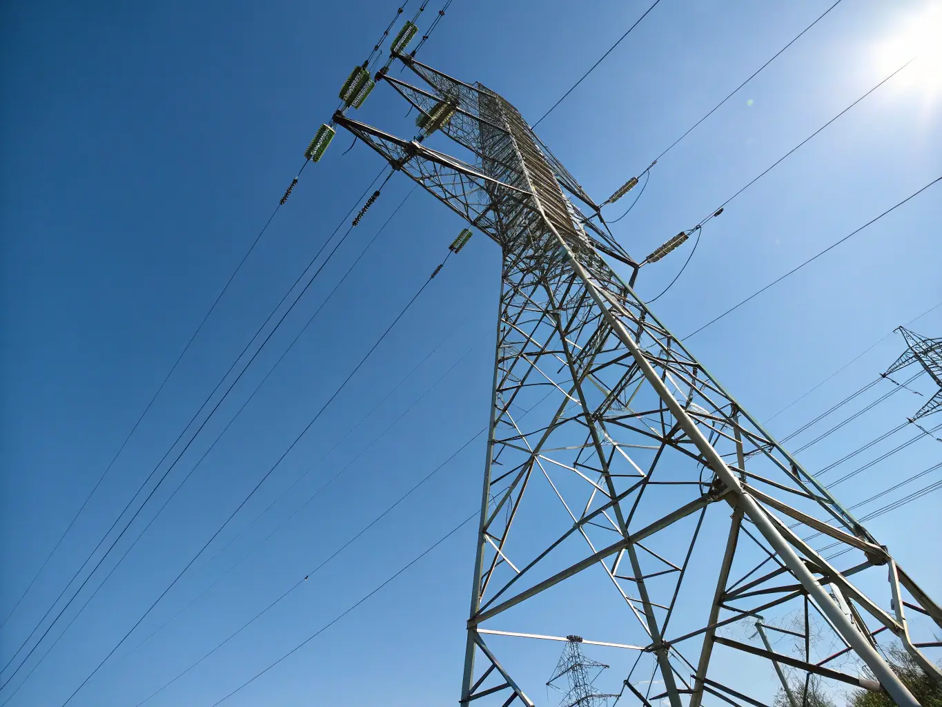 High-tech power transmission cables and renewable energy infrastructure, emphasizing stability and sustainability.