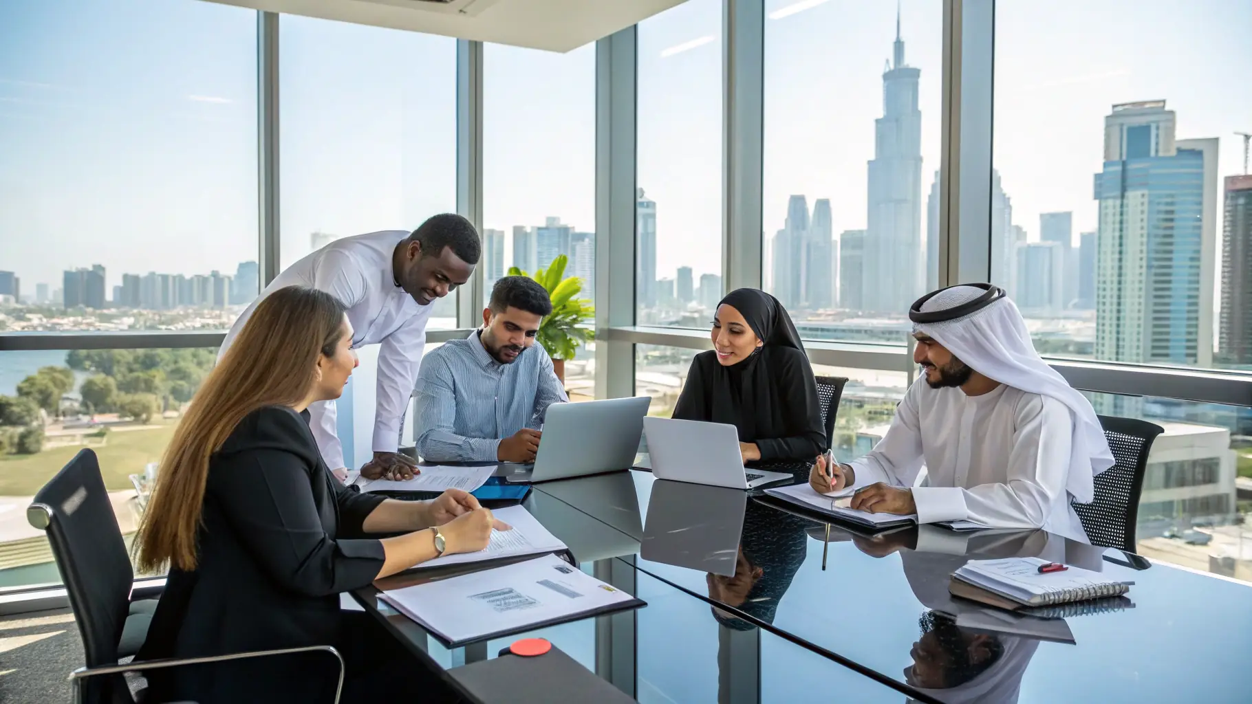 A professional team of consultants working together in a modern office, symbolizing expertise and collaboration
